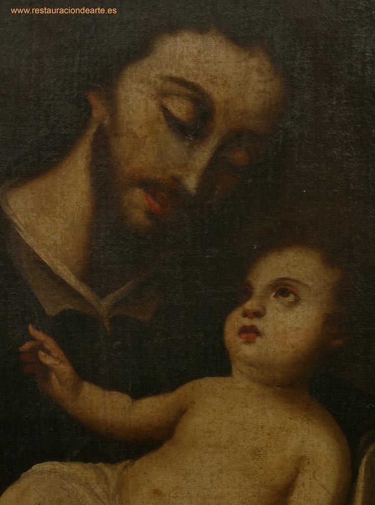 Detalle del rostro de San José y el niño Jesús, oculta tras el grueso barniz oxidado, antes de la restauración