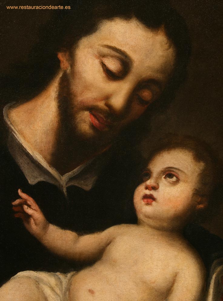 Detalle de la imagen de San José y el niño Jesús después de eliminar el barniz alterado y sucio después de la restauración
